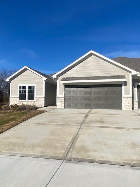 single story home with a garage