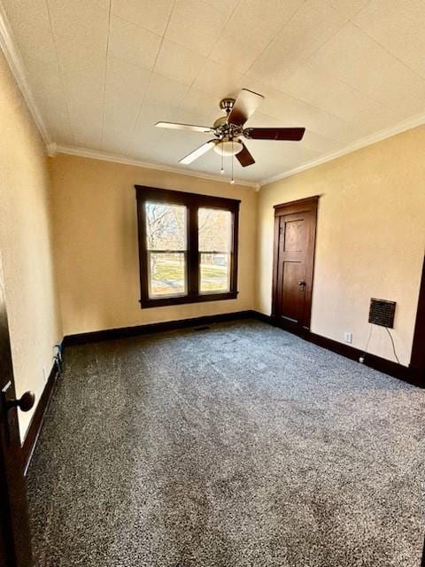 unfurnished room with carpet flooring, ceiling fan, and ornamental molding