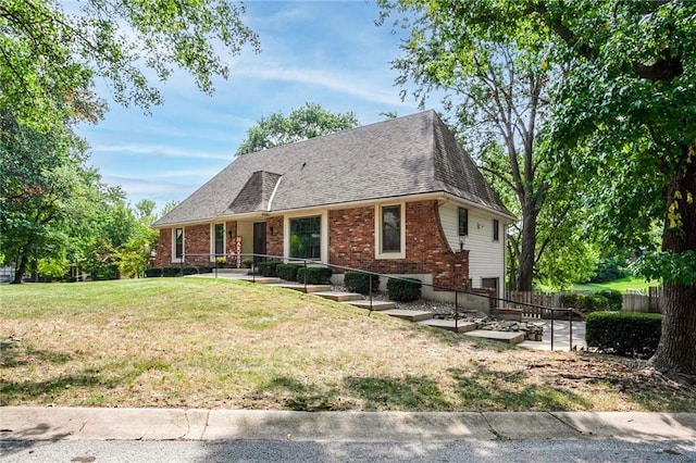 view of front of home with a front yard