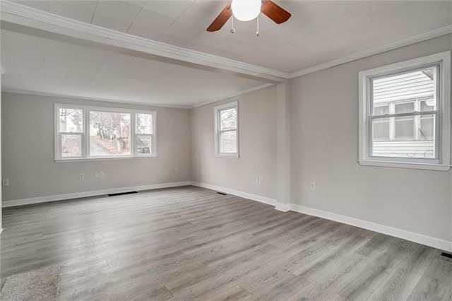 unfurnished room with ceiling fan, crown molding, and light hardwood / wood-style floors