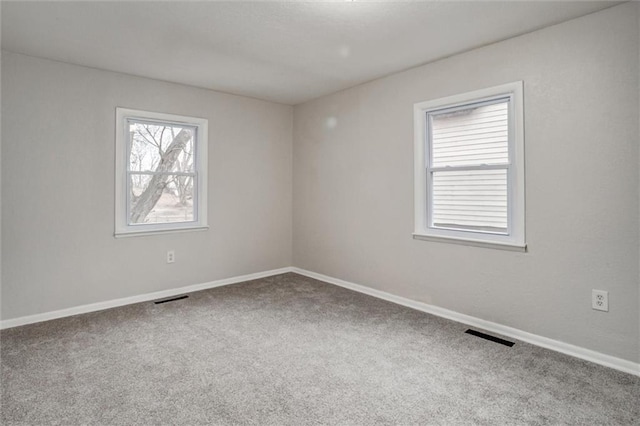 view of carpeted spare room