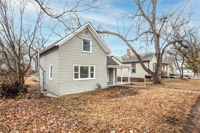 rear view of house with a patio area