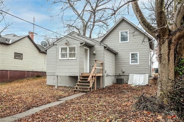 back of property with central AC unit