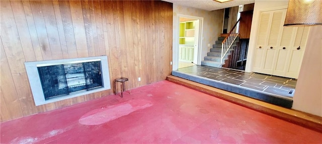 interior space featuring wood walls