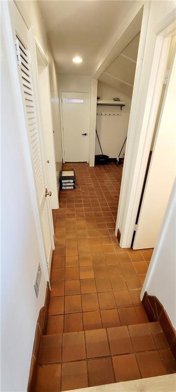 hall featuring tile patterned floors