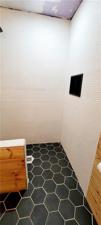 bathroom with a shower