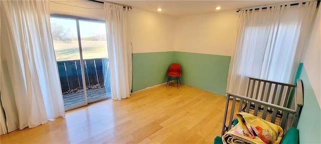 spare room featuring hardwood / wood-style flooring