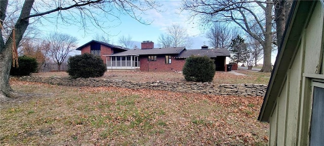 exterior space with a lawn