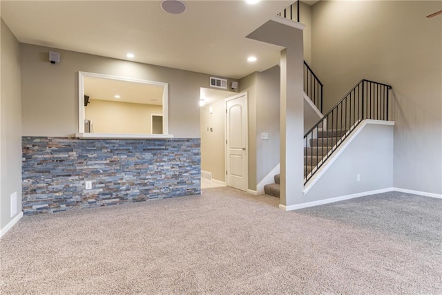 unfurnished living room with carpet