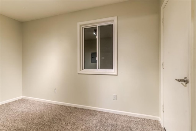 view of carpeted spare room