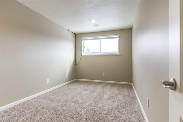 unfurnished room with carpet