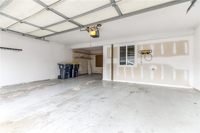 garage featuring a garage door opener