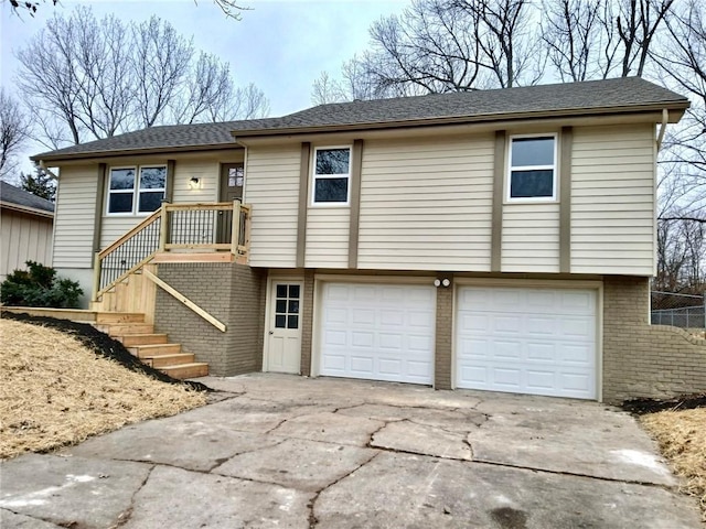 view of front of property with a garage