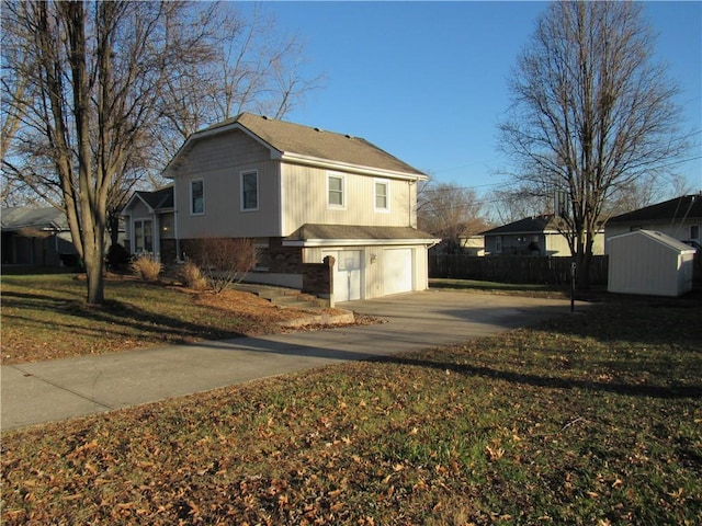 view of home's exterior with a yard and a garage