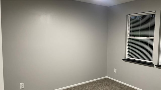 unfurnished room with carpet