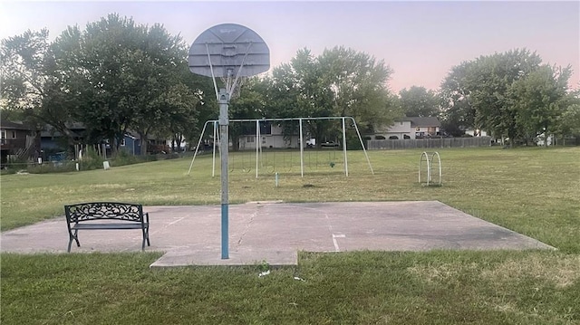 view of community with a lawn and a playground