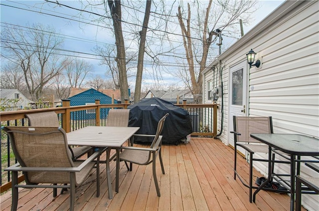 wooden deck with area for grilling