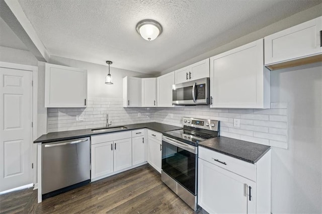 kitchen with white cabinets and stainless steel appliances