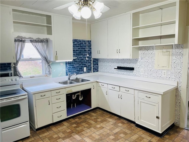 kitchen featuring backsplash, sink, white electric stove, ceiling fan, and white cabinetry