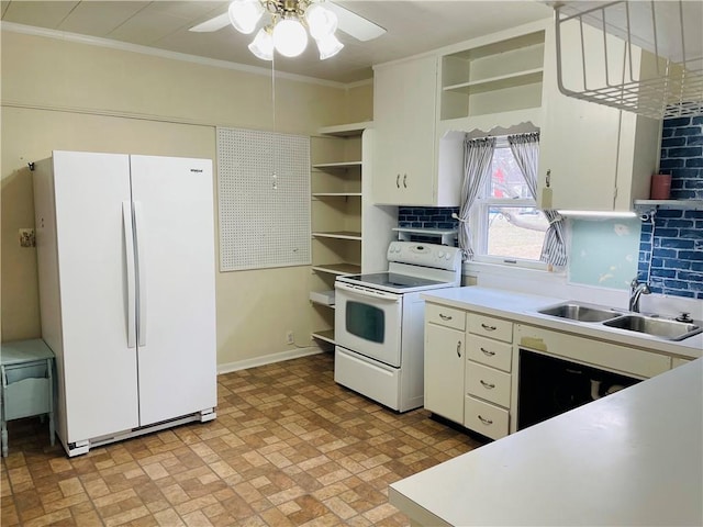 kitchen with ceiling fan, sink, crown molding, white appliances, and white cabinets