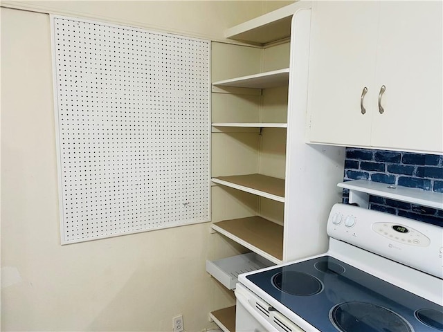 interior space featuring white electric range oven