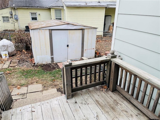 wooden terrace with a storage unit