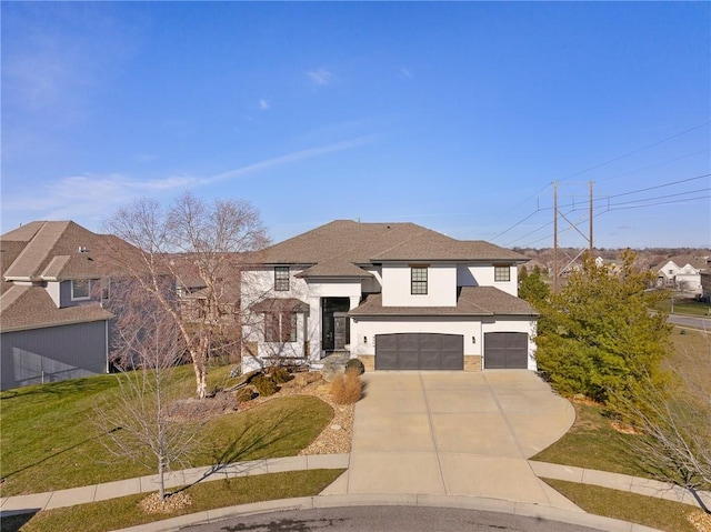 view of front of home with stone siding, driveway, an attached garage, and stucco siding