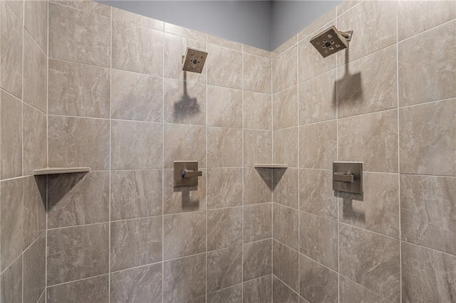 details featuring a tile shower