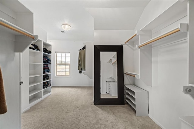 spacious closet with carpet and visible vents