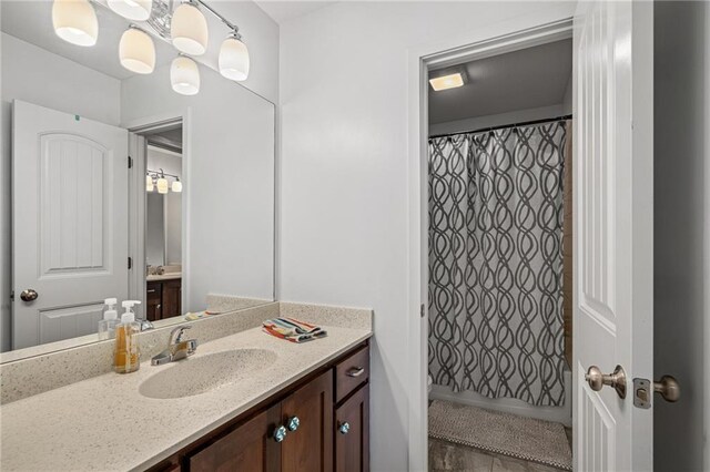 full bathroom with vanity