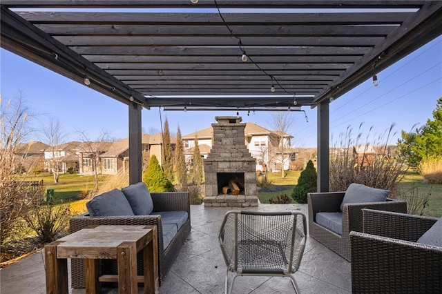 view of patio featuring an outdoor living space with a fireplace and a pergola