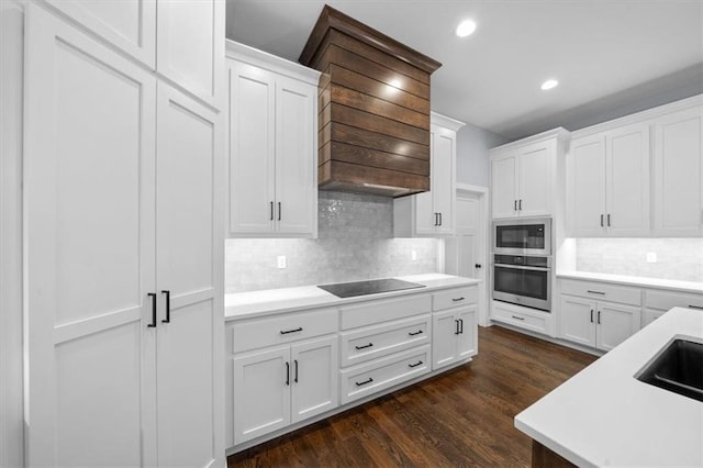 kitchen featuring white cabinetry and stainless steel appliances