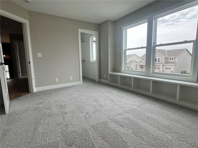 1712 SW Arbormist Dr, Lees Summit, MO 64082 - carpeted empty room featuring baseboards
