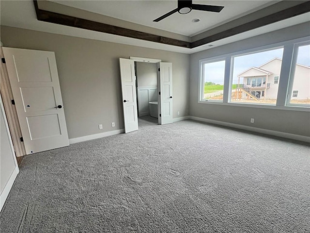 1712 SW Arbormist Dr, Lees Summit, MO 64082 - unfurnished bedroom with carpet flooring and a raised ceiling