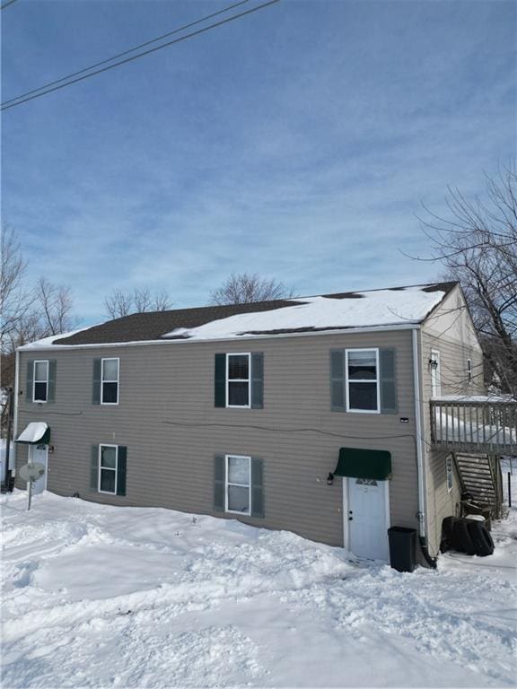 view of snow covered property