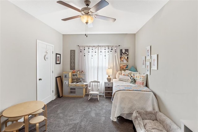 carpeted bedroom with ceiling fan