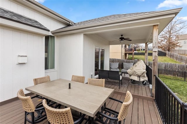 deck featuring ceiling fan and outdoor lounge area