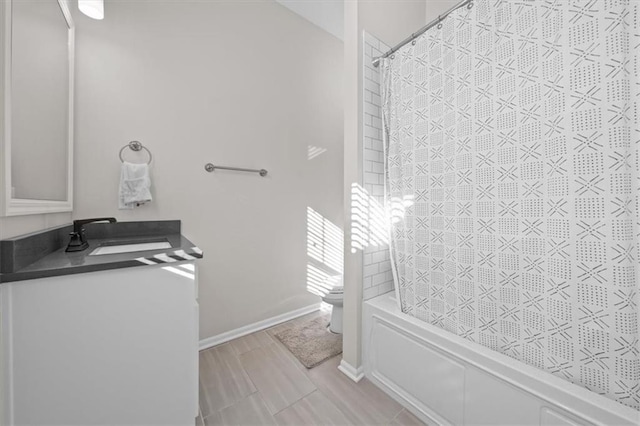 full bathroom featuring vanity, toilet, and shower / bath combo