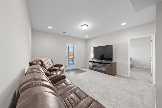 living room featuring light colored carpet