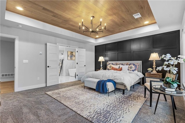 carpeted bedroom featuring a raised ceiling, a notable chandelier, and wood ceiling