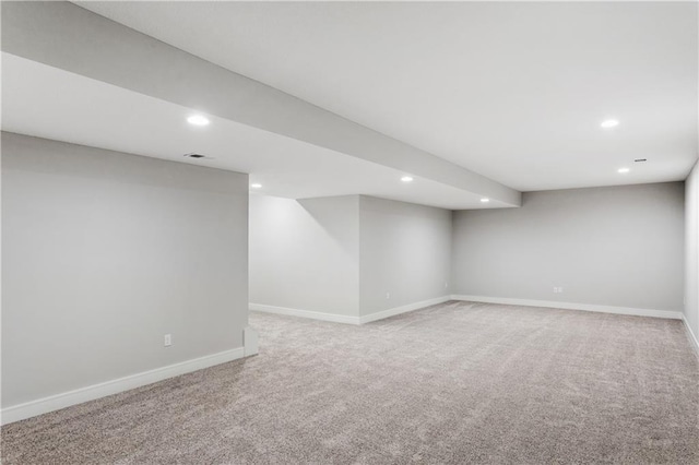 basement featuring carpet floors