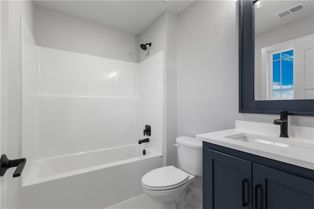 bathroom featuring toilet, visible vents, tub / shower combination, and vanity