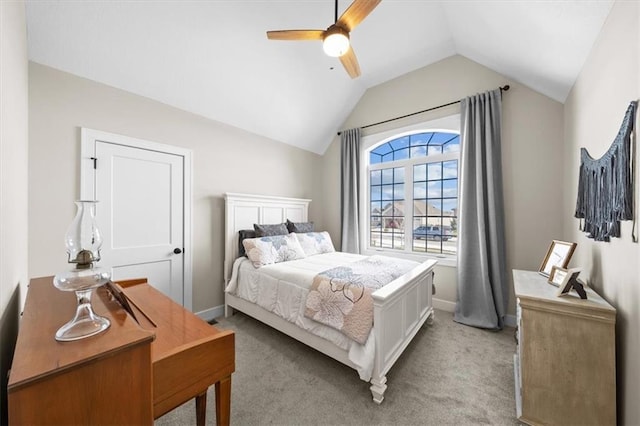 carpeted bedroom with vaulted ceiling and ceiling fan