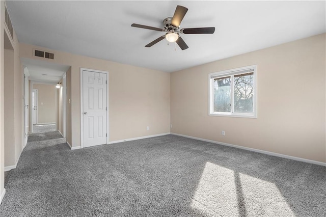 carpeted empty room with ceiling fan