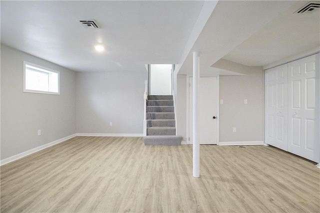 basement with light wood-type flooring