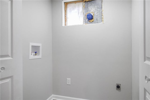 laundry room featuring hookup for a washing machine and hookup for an electric dryer