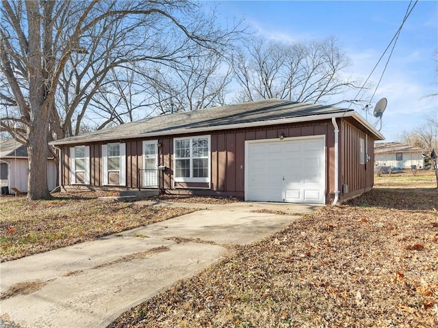 ranch-style home with a garage