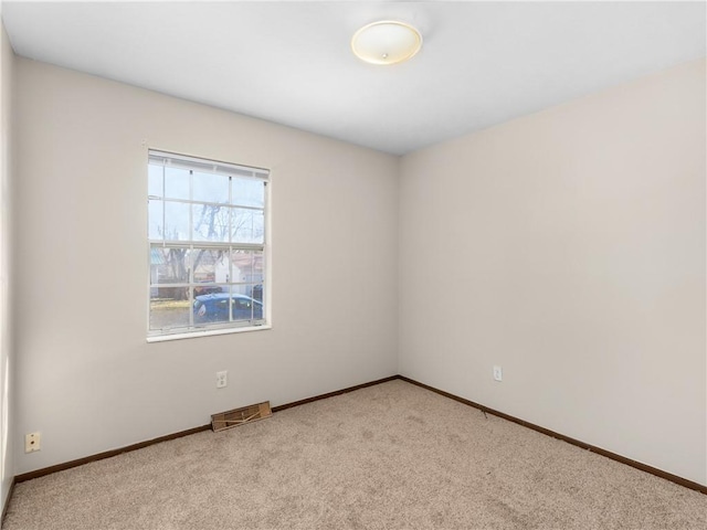 view of carpeted spare room