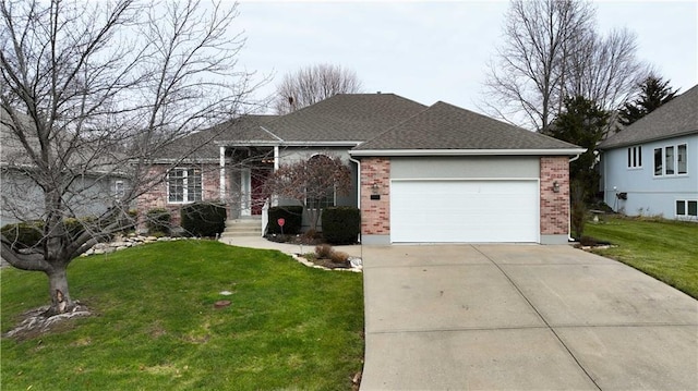 ranch-style house featuring a garage and a front lawn