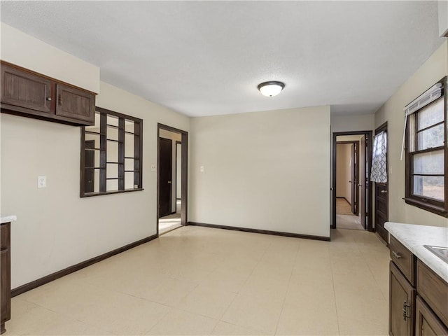 kitchen with dark brown cabinets